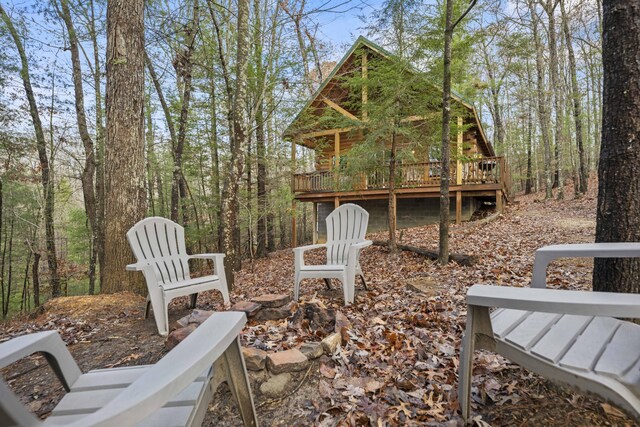 559 Eagle Ridge Rd, Campton, KY 41301 - view of yard with a wooden deck and an outdoor fire pit
