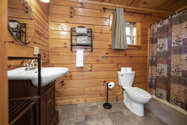 559 Eagle Ridge Rd, Campton, KY 41301 - full bath featuring wood walls, stone finish floors, vanity, wooden ceiling, and a shower with curtain