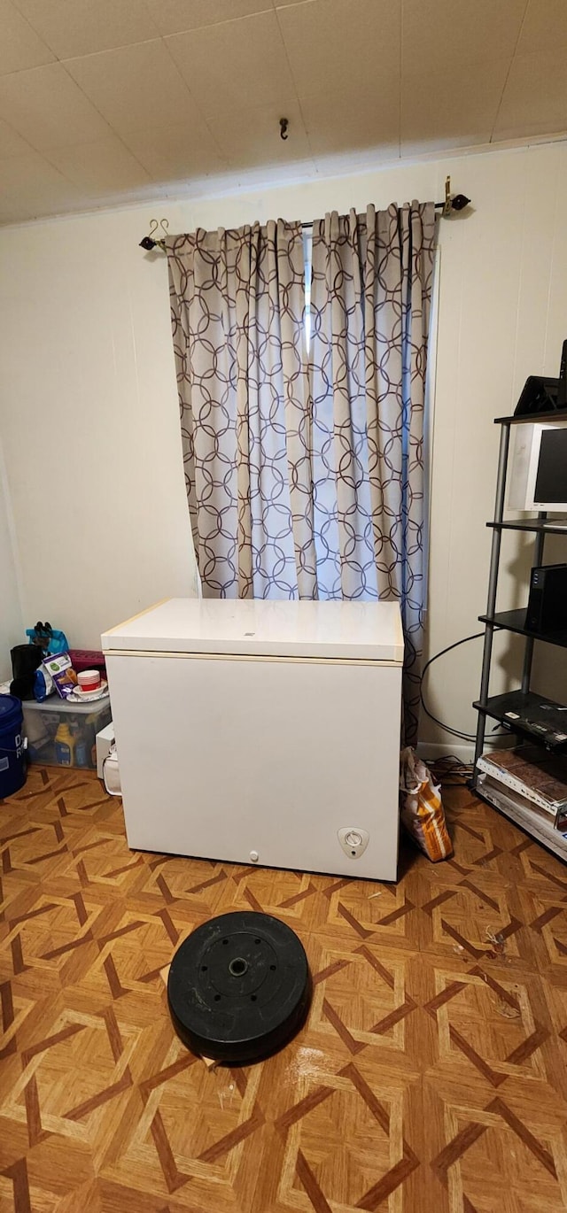 interior details featuring white refrigerator