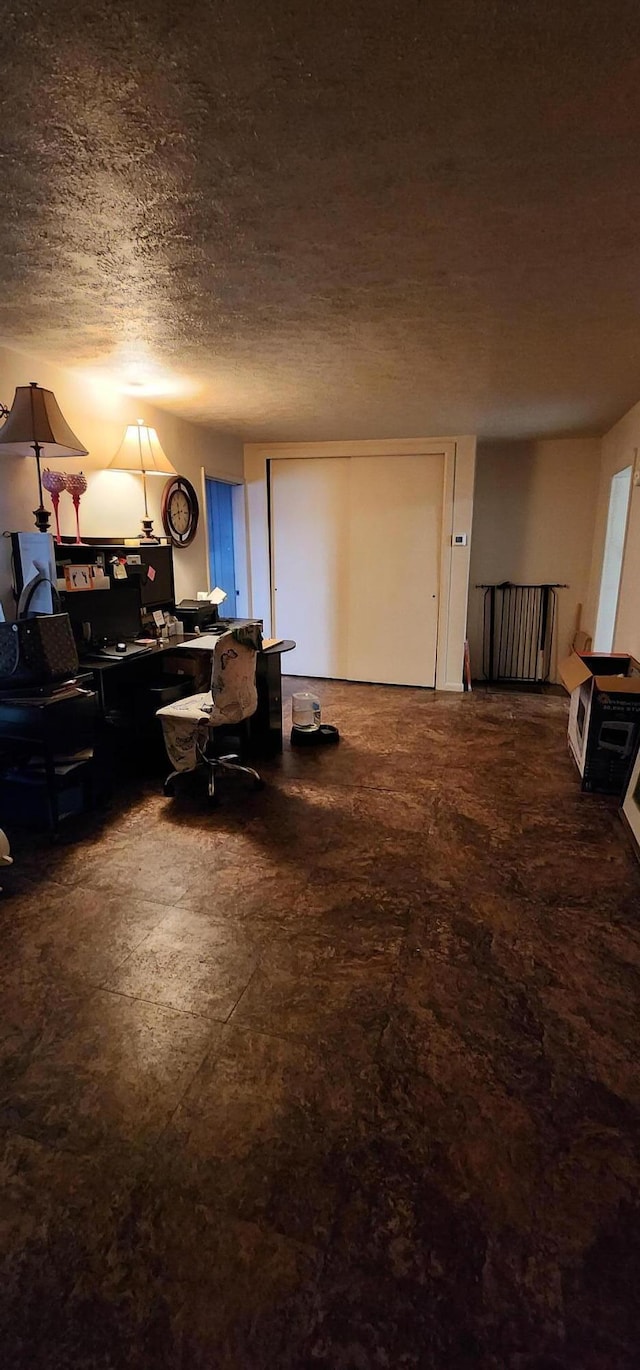 living room with a textured ceiling