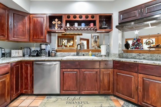 kitchen with dishwasher, light tile patterned flooring, sink, stovetop, and light stone counters