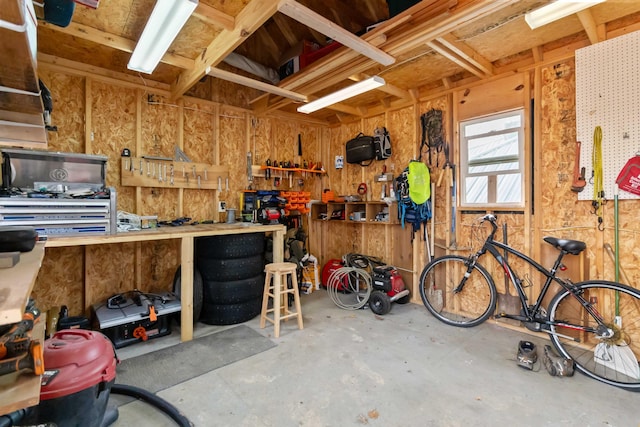 garage featuring a workshop area