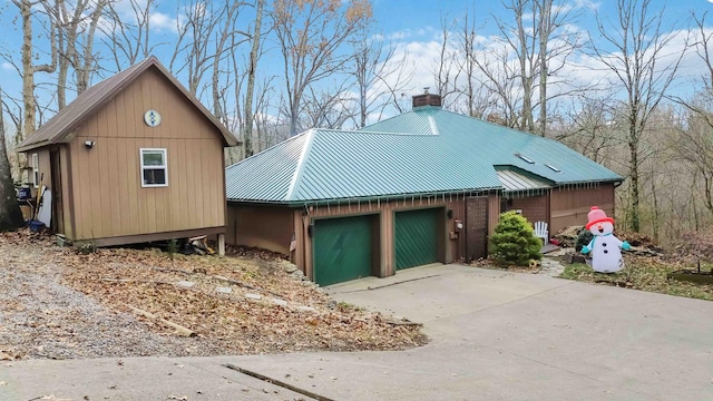 view of property exterior featuring a garage