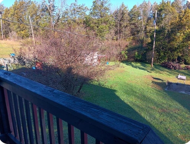 view of yard with a forest view