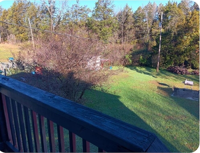 view of yard with a wooded view