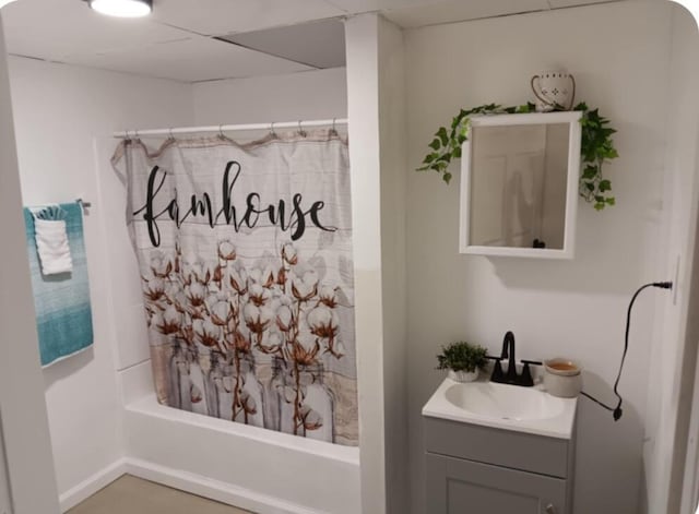 bathroom with vanity and shower / bath combo with shower curtain