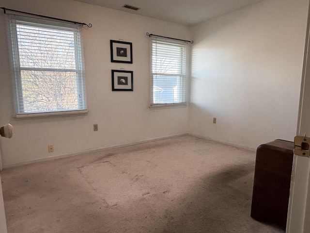 view of carpeted spare room