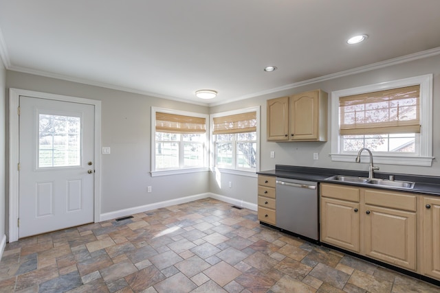 kitchen featuring visible vents, baseboards, dishwasher, dark countertops, and a sink