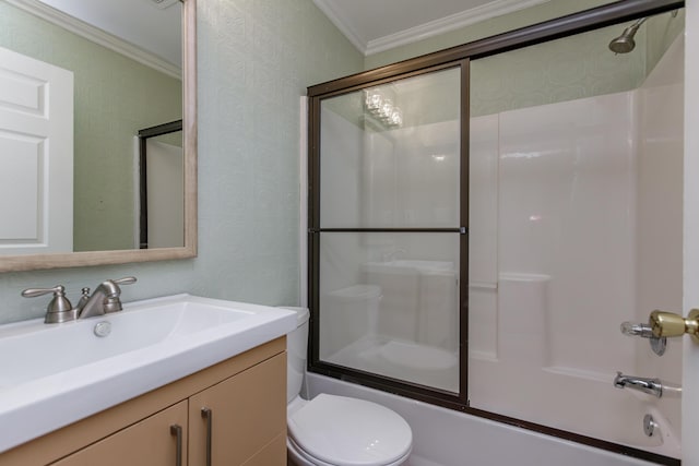 bathroom with a textured wall, toilet, enclosed tub / shower combo, crown molding, and vanity