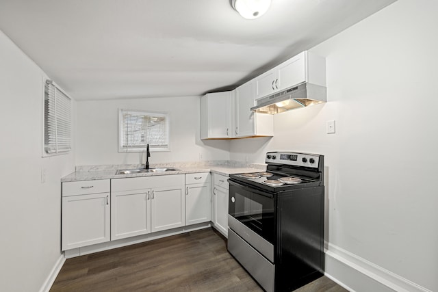 kitchen with dark hardwood / wood-style flooring, ventilation hood, sink, white cabinetry, and stainless steel electric range oven
