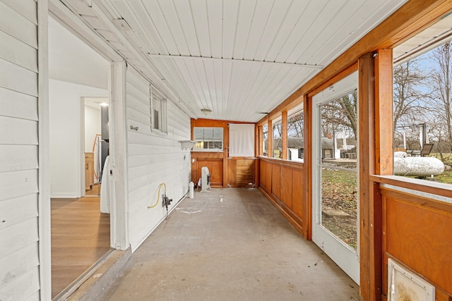 unfurnished sunroom with a healthy amount of sunlight