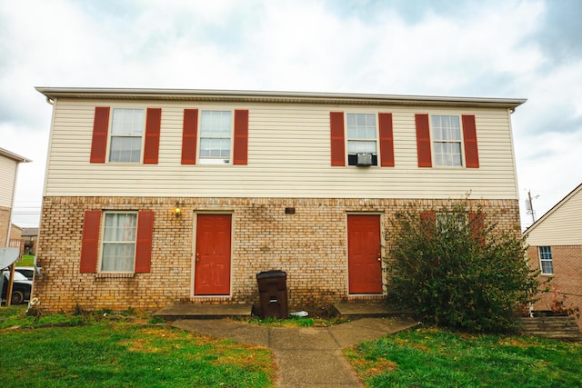 view of front of property with a front lawn