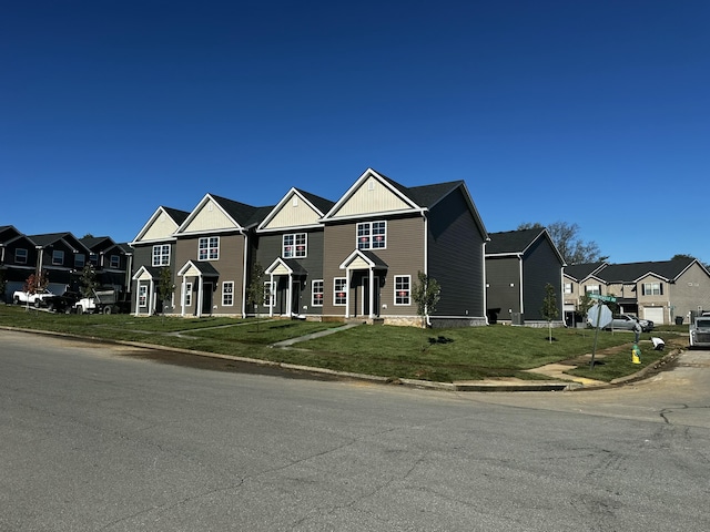 view of front of home with a front lawn