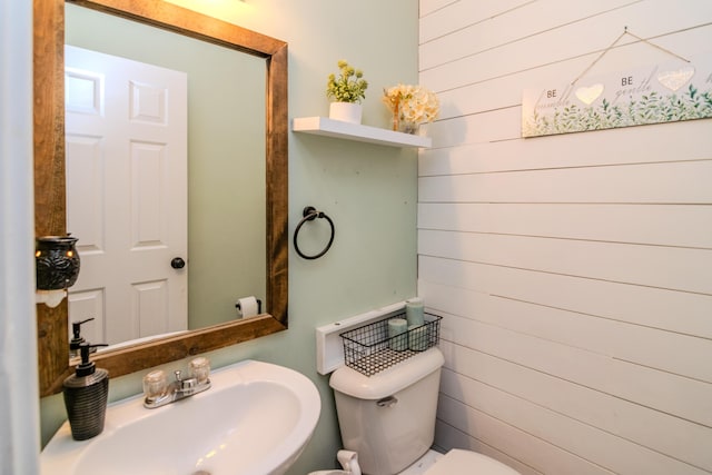 bathroom with a sink and toilet