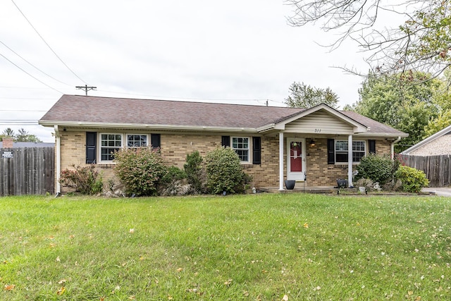 ranch-style house with a front lawn