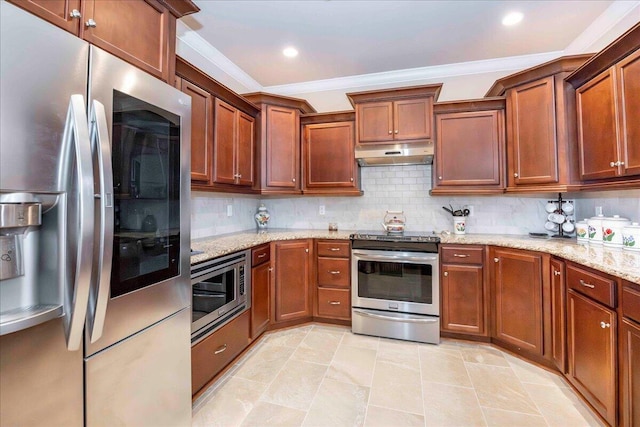 kitchen with backsplash, light stone countertops, stainless steel appliances, and ornamental molding