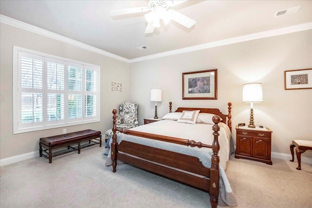 bedroom featuring ceiling fan, crown molding, and light carpet