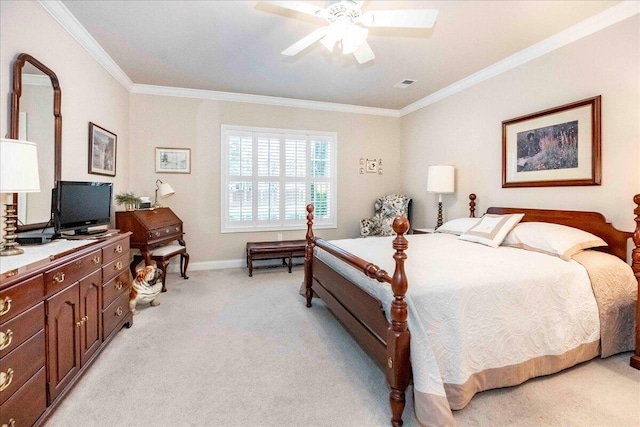 bedroom featuring light carpet, ceiling fan, and crown molding