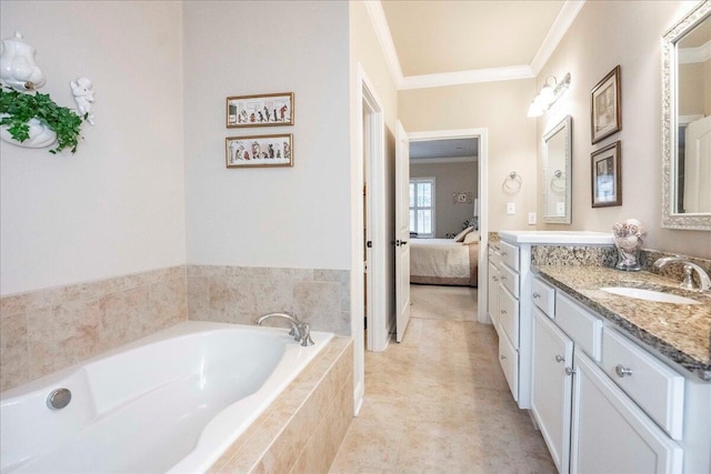 bathroom featuring vanity, a relaxing tiled tub, and crown molding