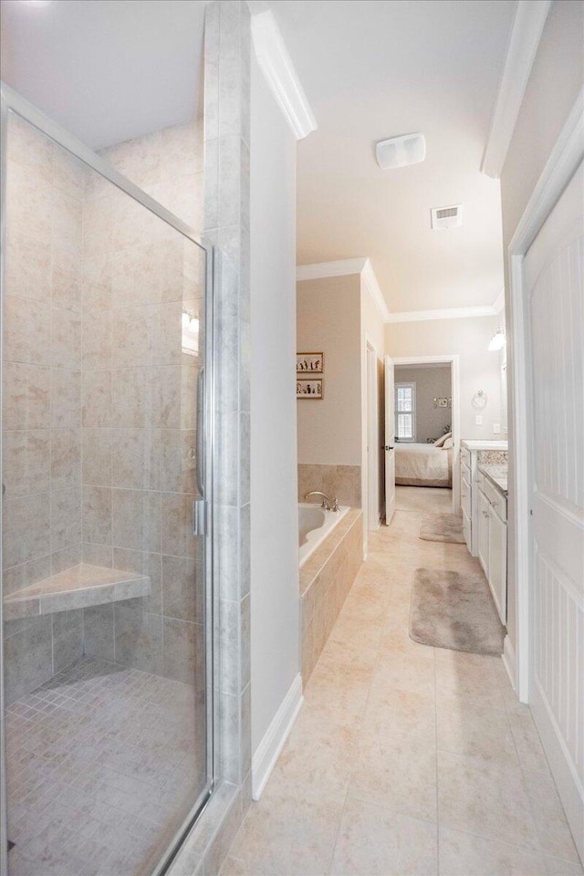 bathroom featuring tile patterned flooring, vanity, plus walk in shower, and ornamental molding