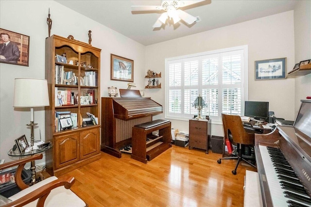 office featuring ceiling fan and light hardwood / wood-style floors