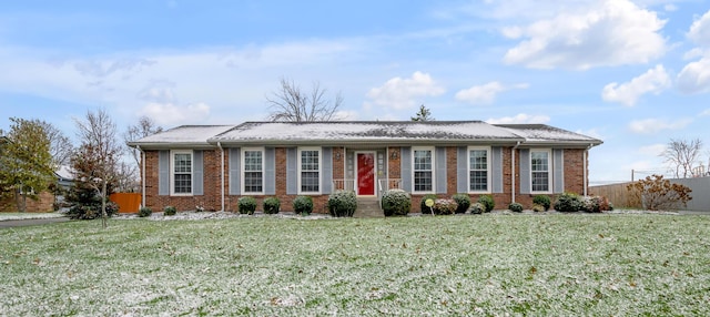 ranch-style house featuring a front lawn