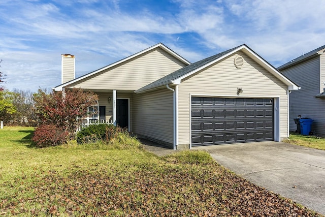 ranch-style home with a garage and a front yard