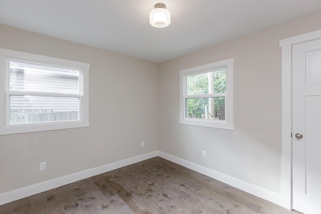 spare room with light wood-type flooring