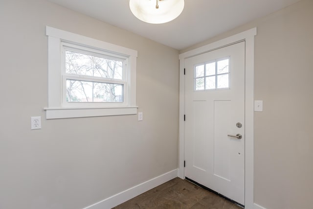 entrance foyer featuring plenty of natural light