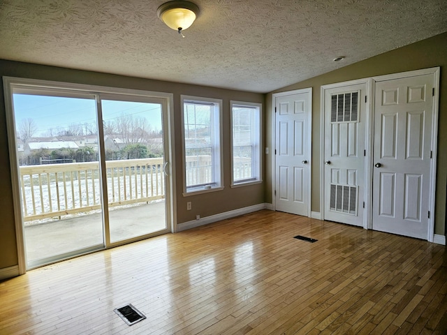 interior space featuring lofted ceiling