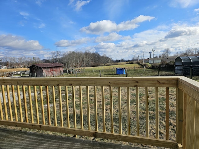 wooden deck with an outdoor structure