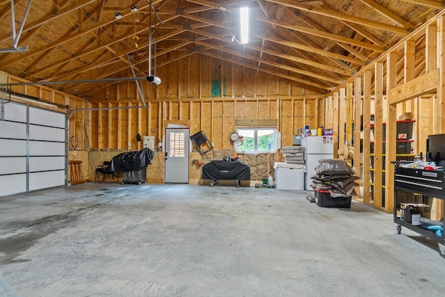 garage with white fridge