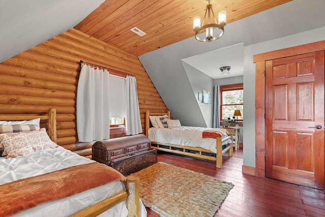 bedroom with an inviting chandelier, dark hardwood / wood-style flooring, wooden ceiling, and vaulted ceiling