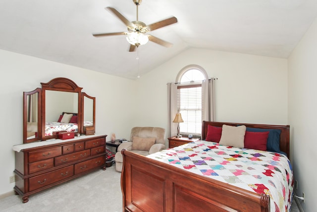 carpeted bedroom featuring ceiling fan and lofted ceiling