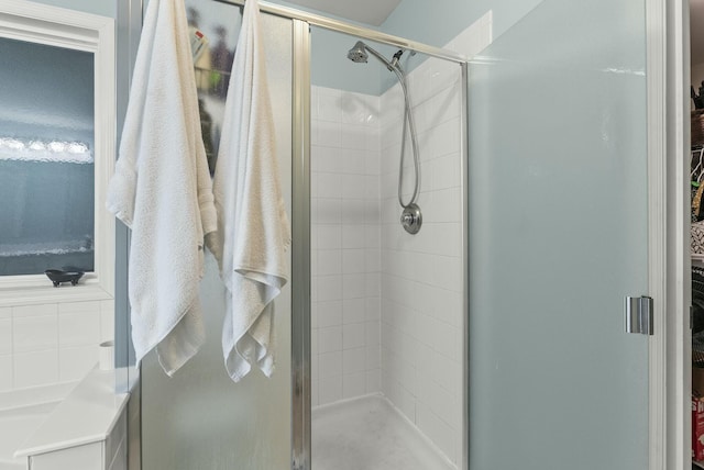 bathroom with an enclosed shower