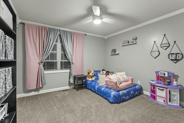 bedroom with ceiling fan, carpet, and ornamental molding