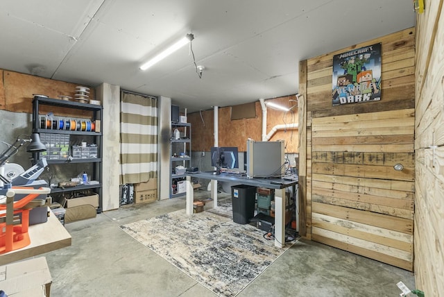 home office with concrete flooring