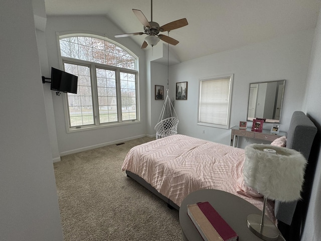 carpeted bedroom featuring ceiling fan and lofted ceiling