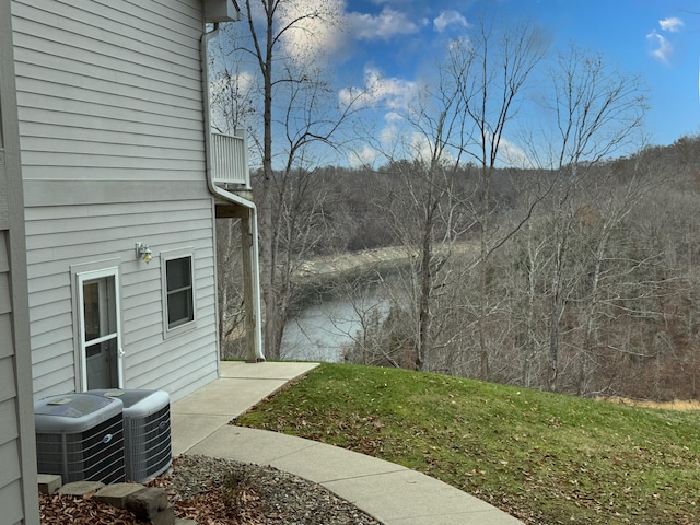 view of yard featuring central AC