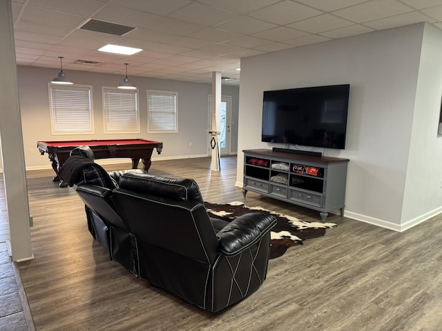 living room with a paneled ceiling, hardwood / wood-style flooring, and billiards