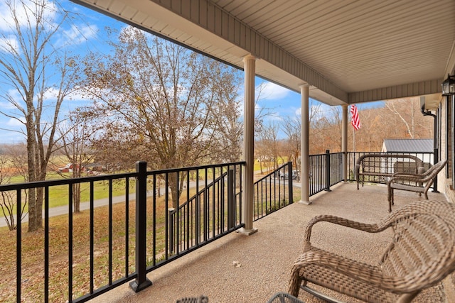 balcony featuring a porch