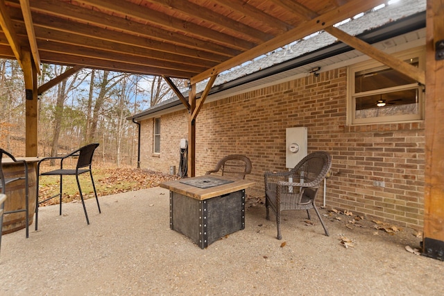 view of patio featuring a fire pit