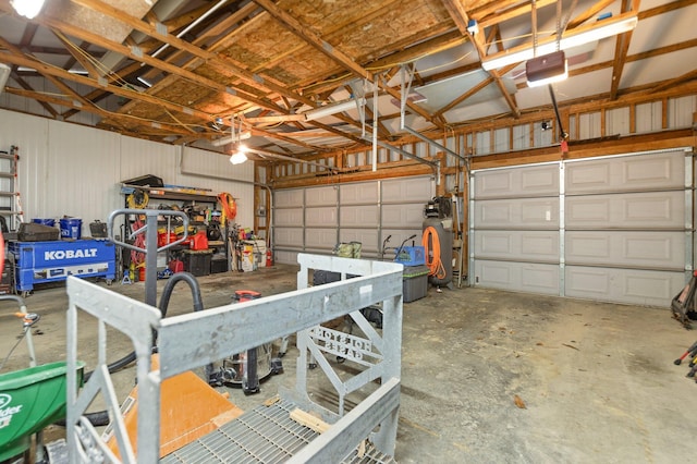 garage featuring a garage door opener