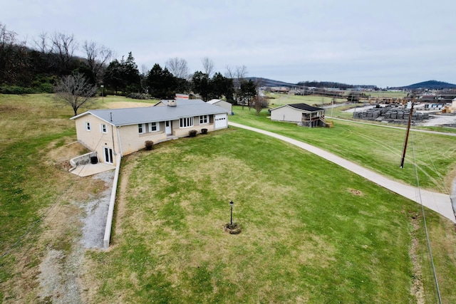 drone / aerial view featuring a mountain view