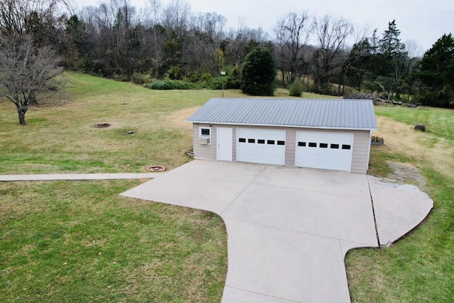 garage with a lawn