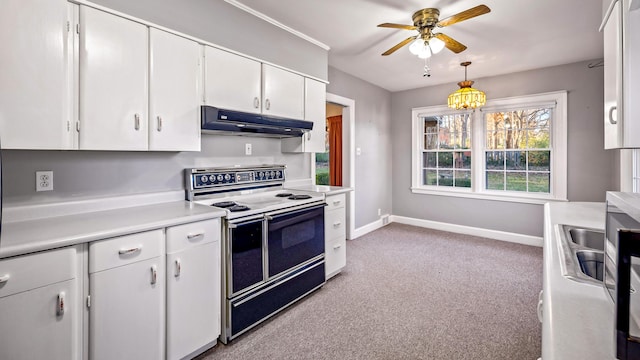 kitchen with light carpet, pendant lighting, white cabinetry, and range with electric stovetop