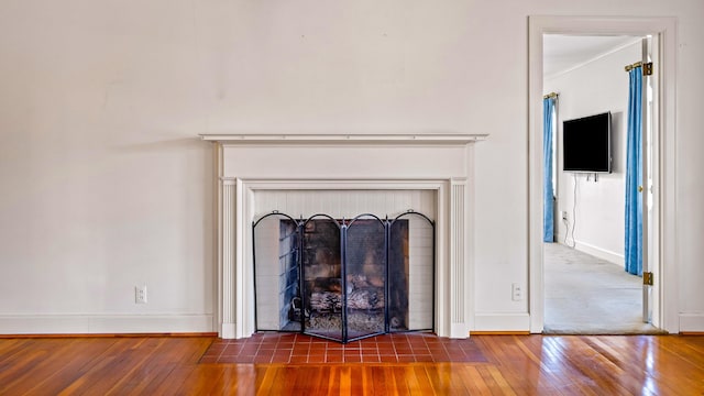 interior details featuring hardwood / wood-style floors