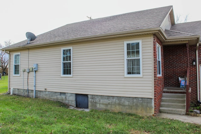 view of home's exterior featuring a lawn