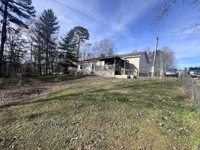 view of yard with a sunroom