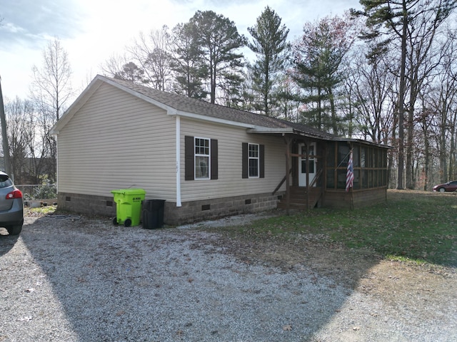 exterior space with a sunroom